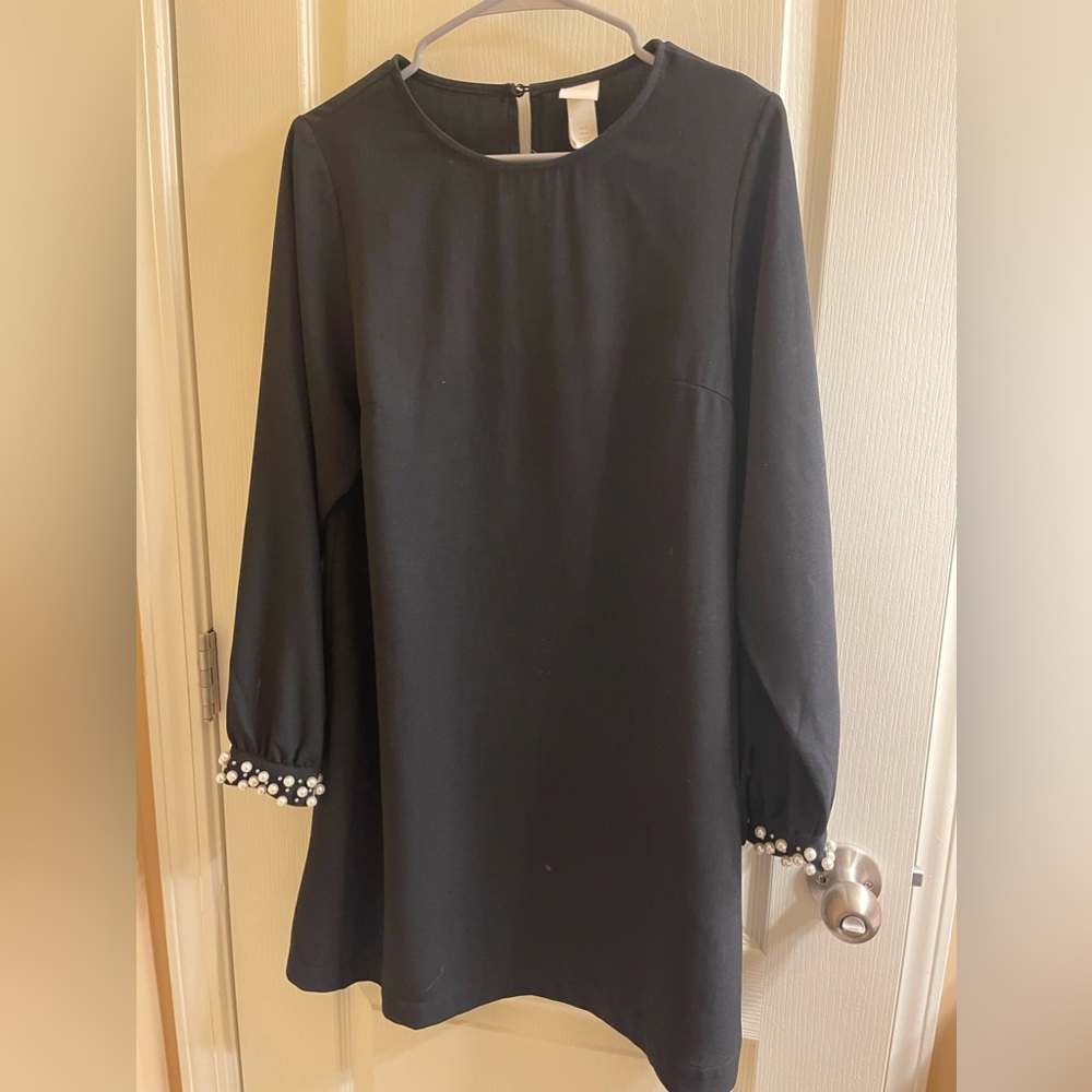 Black midi dress with pearl sleeves
